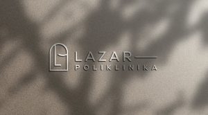 Logotip Lazar Poliklinike kao reljefni natpis na zidu