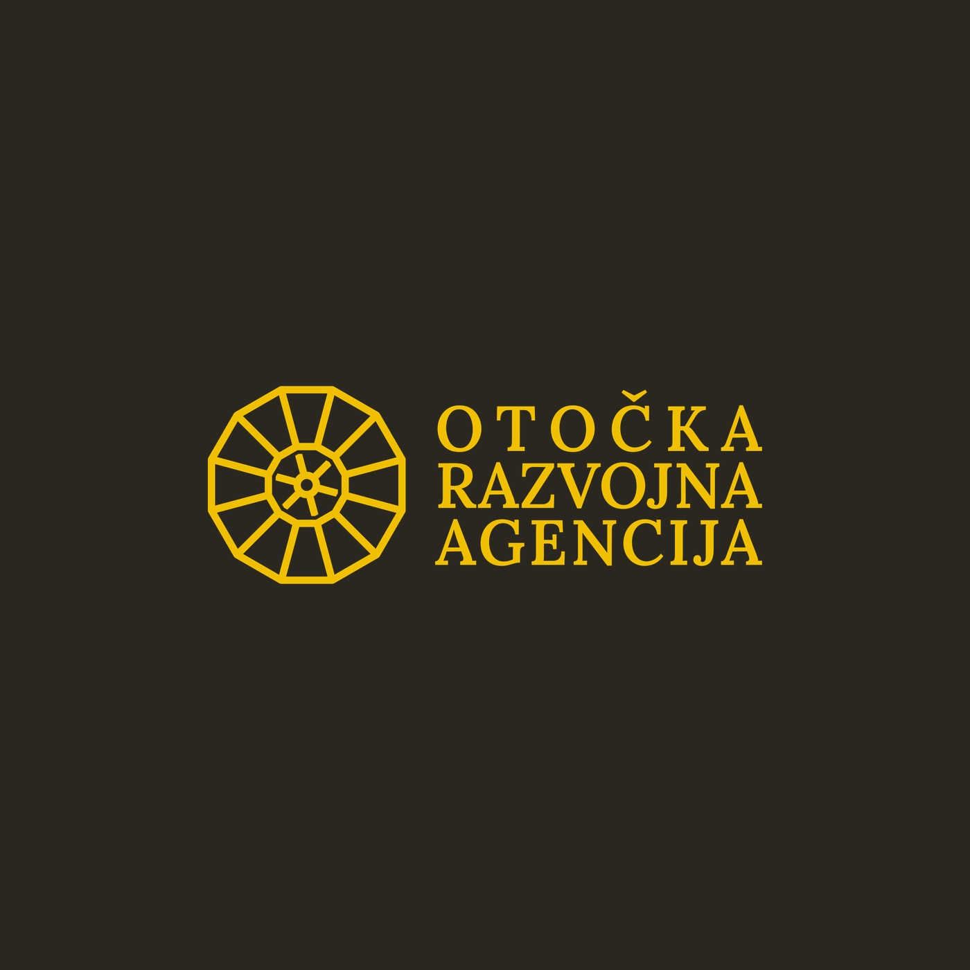 Logotip Otočke razvojne agencije (ORA) u zlatnoj boji na tamnoj podlozi